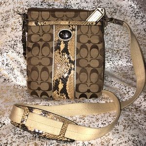 Snakeskin coach purse
